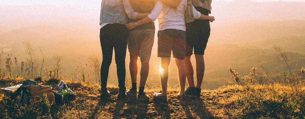 A group joining hands, from the original FSP Network website